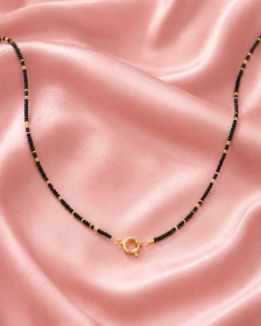 Zwart en goud kralen ketting