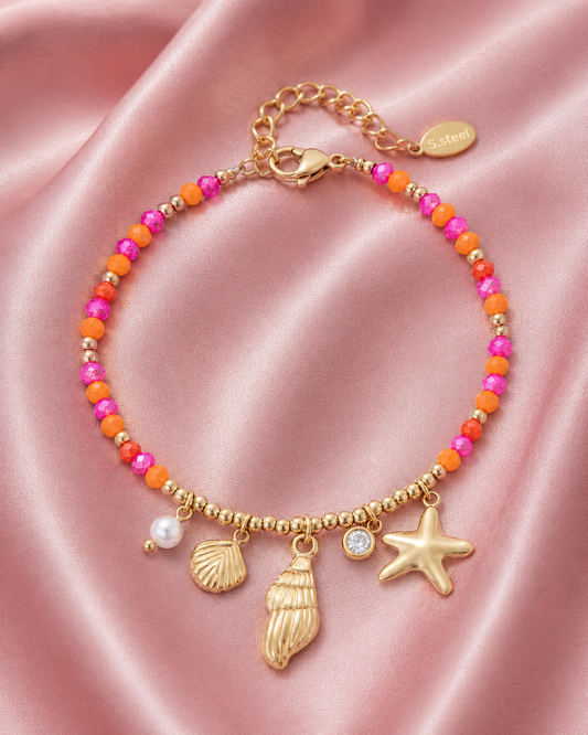 Kralenarmband met schelpenbedels