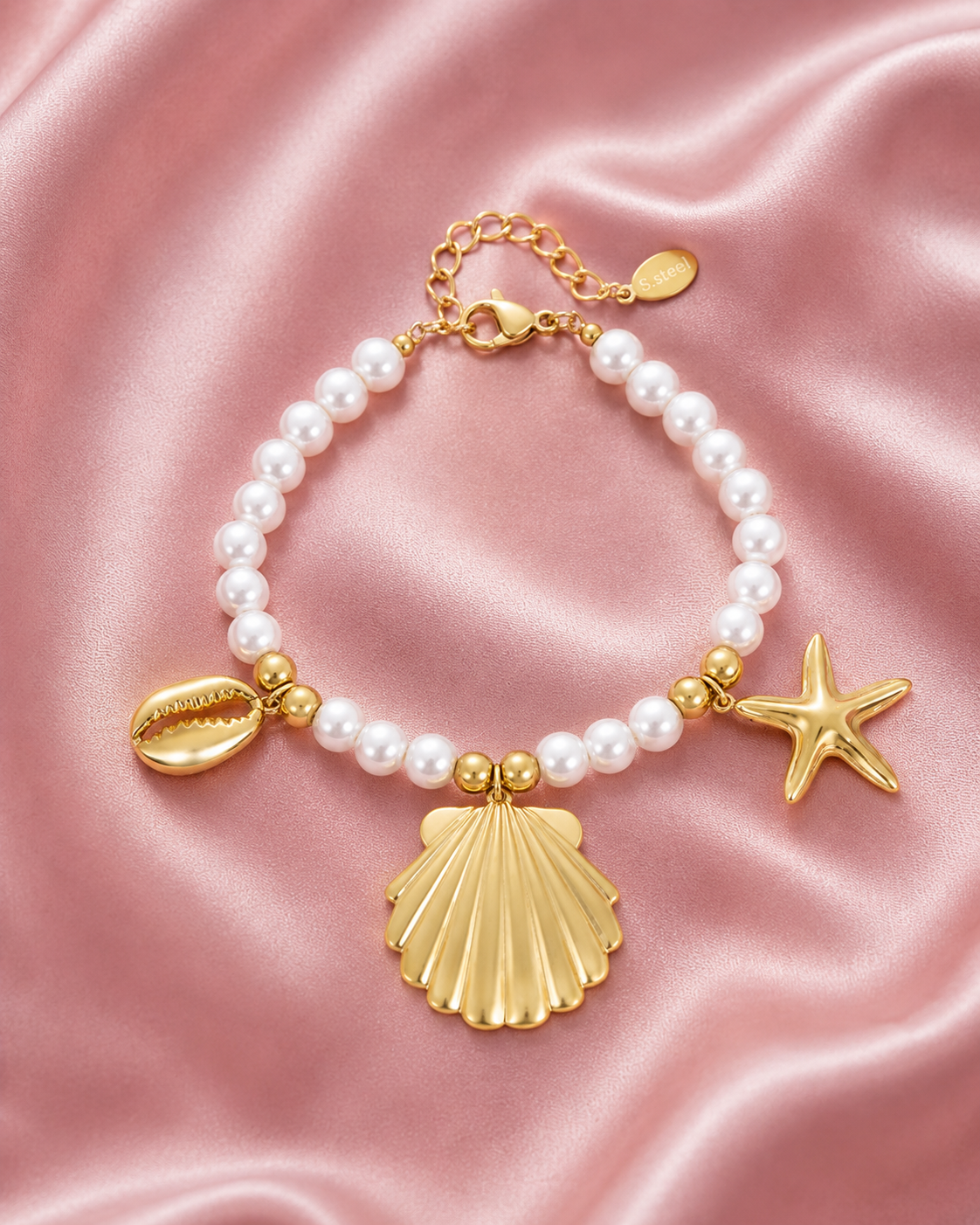 Parel armband met schelpenbedels